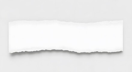 Fototapeta premium Ripped edge of a blank white paper strip on plain surface