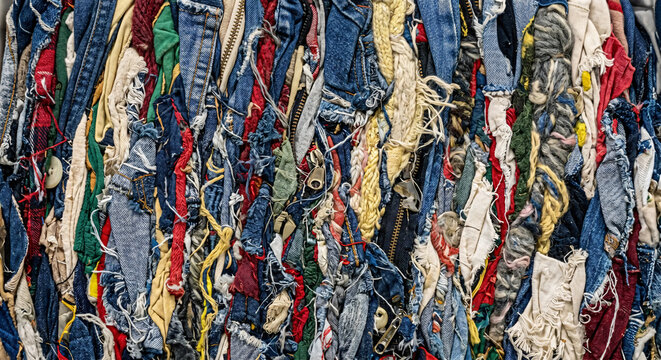 Full Frame Texture of Compressed Recycled Textile Waste and Denim Scraps