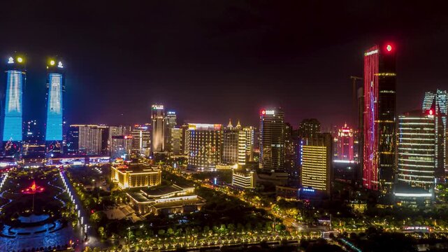 Nanchang China modern skyline with illuminated high rise towers at night