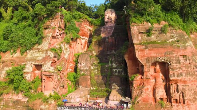 Leshan Giant Buddha on Forested Red Cliffs in Sichuan China in Leshan Giant Buddha, Sichuan, China