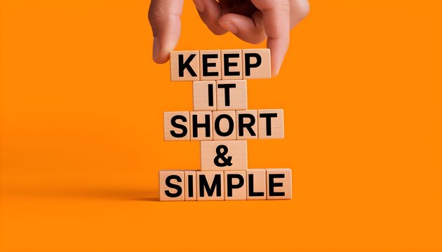 Keep It Short and Simple Concept - Wooden Blocks in Handkeep it short and simple
