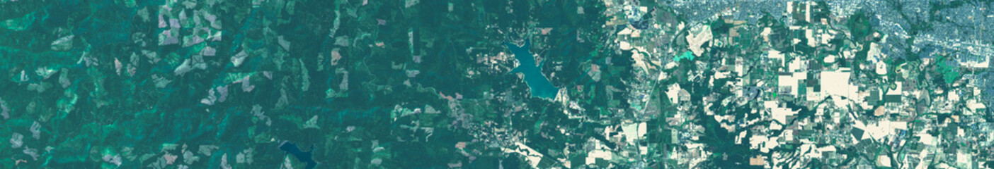 Fototapeta premium Portland Suburban Area in the USA Viewed from Space – Suburban Landscapes, Farmland and Forests in Satellite Imagery
