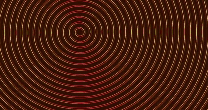 Abstract circular ripples expanding in vibrant colors background video.