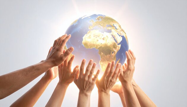 Diverse hands reach up to support a glowing Earth, symbolizing global unity and environmental protection. This inspiring image represents international cooperation and sustainability.