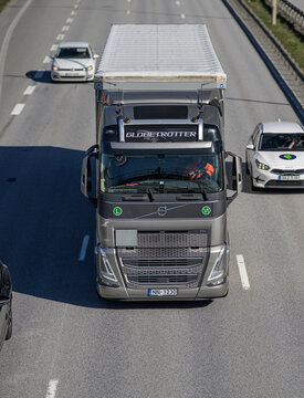 Gothenburg, Sweden - April 24 2026: Large freight truck driving on highway surrounded by passenger cars.