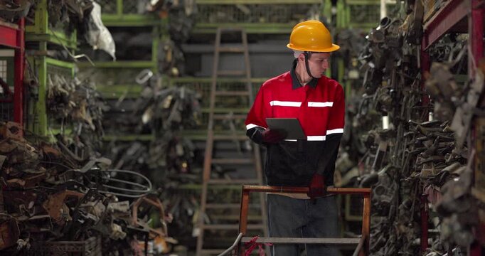 Warehouse Technician Auditing Auto Parts Inventory