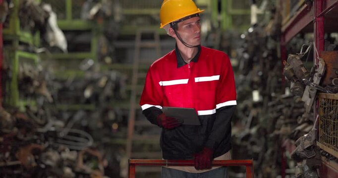 Warehouse Technician Auditing Auto Parts Inventory