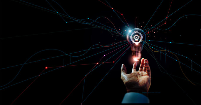 
Innovation. Innovative idea and inspiration, Hand of Businessman holding light bulb of new idea for business and sustainable development. Ai, technology, science, network and communication.