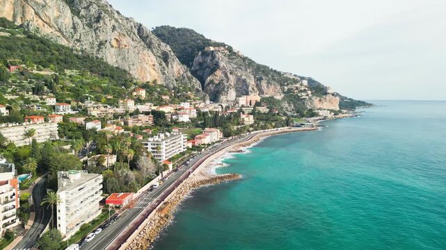 Aerial view of Menton France showcasing Mediterranean coastline and historic town from above