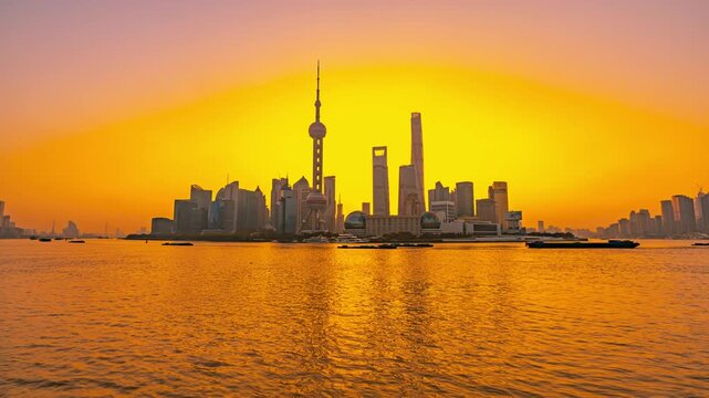 Shanghai Pudong Skyline at Sunset Over Huangpu River in Shanghai Pudong, China
