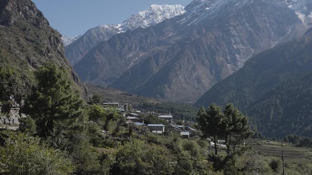 Sunny Day at Chhokang Paro Village with Himalayan Backdrop in Tsum Valley Gorkha Nepal