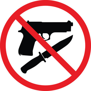 No weapons allowed prohibition sign with gun and knife crossed out in red circle representing safety security and peace concept