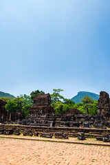Fototapeta premium My Son sanctuary archaeological site near Da Nang, Vietnam. Ancient Cham Kingdom hindu temple ruins