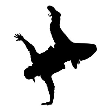 Silhouette of bboy breakdancer doing a freeze handstand pose.