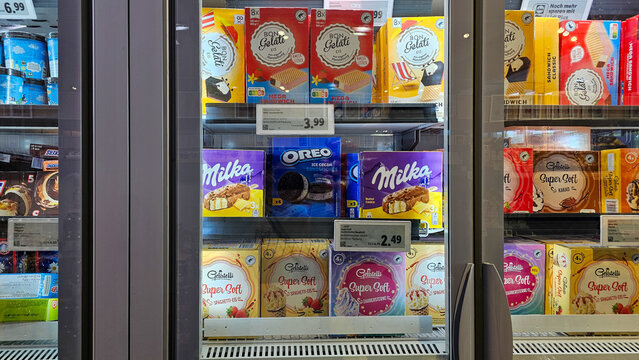 Freezer cabinet displaying various ice cream brands for sale