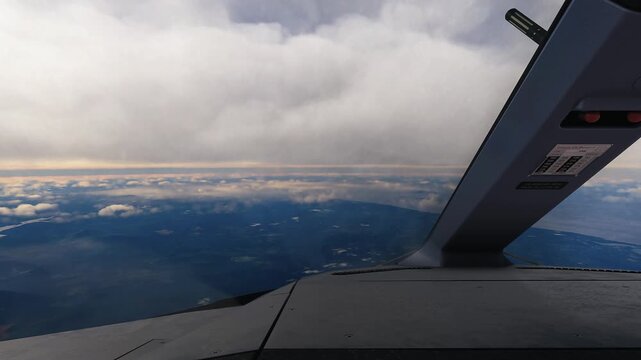 Stunning Aerial View from Airplane Cockpit Window During Flight.