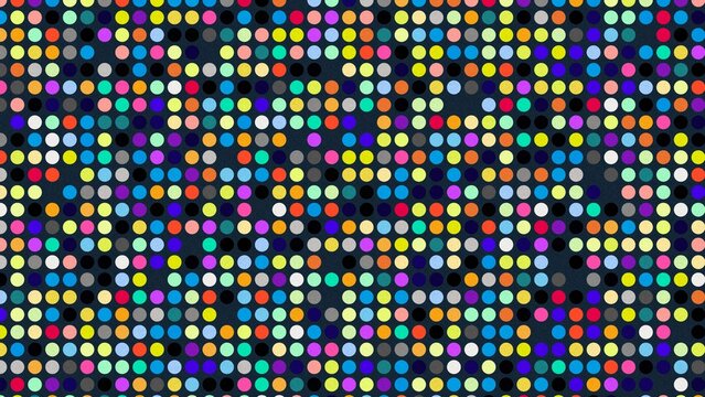 Colorful dots pattern on a dark background