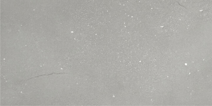 A rough grey concrete surface with a dirty grunge texture and raindrops on the window creating an abstract vintage pattern