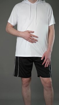 Stomach ulcer, man with abdominal pain suffering on gray background