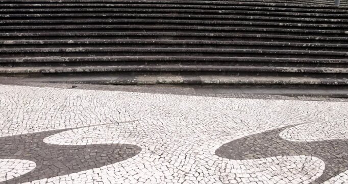 A large church with a steeple and a cross on top in Ribeira Grande, Azores.