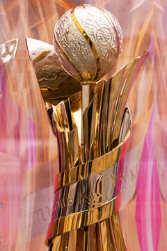 Close up of golden Ukrainian Football Cup trophy with traditional ornaments and trident