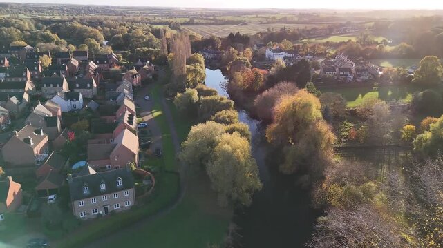 Aerial View of Thrapston Market Town with Church Tower and River Nene at Golden Hour Northamptonshire