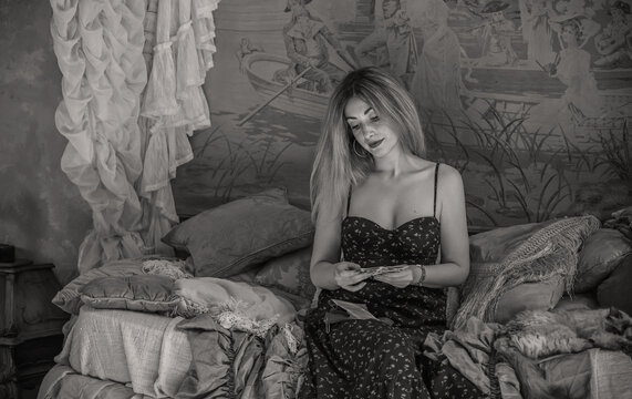 Elegant Woman Tarot Reader in Vintage Bohemian Interior