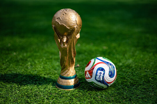 May 7, 2026, United States. The trophy of the 2026 FIFA World Cup and the official Adidas Trionda ball on the green lawn of the stadium.