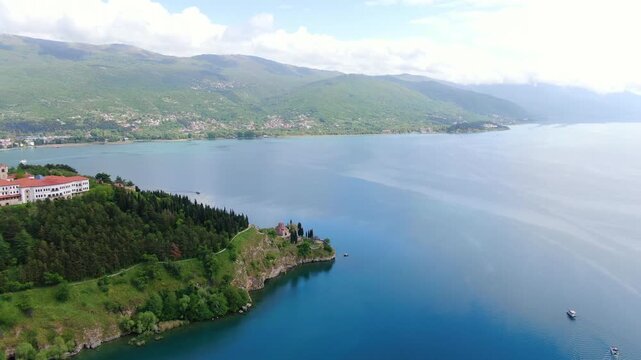 Aerial view on Ohrid lake in North Macedonia on Border with Albania. Drone Video of Coastal City and buildings near water. Top view 