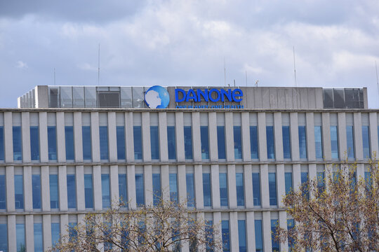 Danone company office with signage, logo, emblem. French multinational food-products corporation. WARSAW, POLAND - APRIL 28, 2026