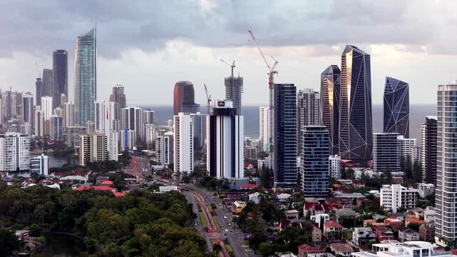 Back aerial cityscape urban view of Gold Coast Surfers paradise towers Australia.
