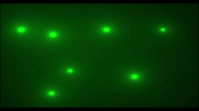 Green color abstract light background. The concept of popularity, public life, fame, paparazzi and stardom. Stock video with bright flashes for overlay on black beckground
