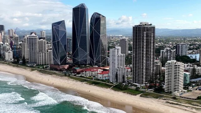 Zoom in Gold Coast Surfers paradise city urban waterfront in Queensland &ndash; aerial view.