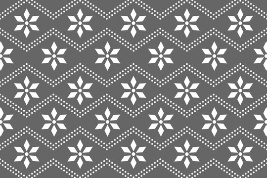 Seamless winter pattern with elegant white snowflakes and geometric lines on a dark background, ideal for festive holiday designs
