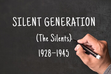 Naklejka na ściany i meble Silent Generation written on blackboard with hand, The Silents born 1928 to 1945, generational demographics and social research concept