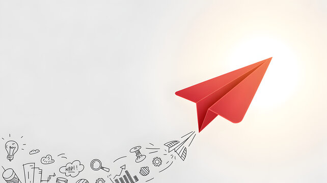Red paper airplane launching with business doodles in bright sunlight representing innovation and new ventures