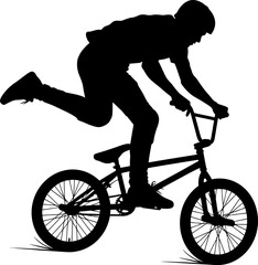 Fototapeta premium Silhouette of a BMX rider performing an aerial trick on a bicycle.