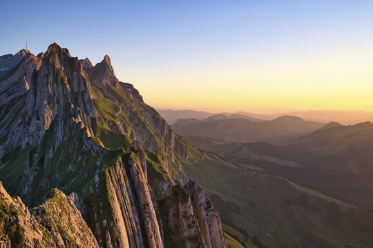 Alpstein mountains with ridge in the evening light, cloudless sky over Appenzellerland, Canton Appenzell Innerrhoden, Switzerland