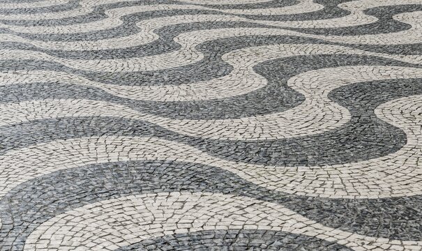 Wavy pattern in pavement, black and white, cobblestones, Rossio, Lisbon, Portugal