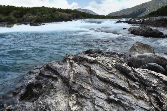 Rapids at the confluence of blue Baker river and grey Neff river, Pan-American Highway between Cochrane and Puerto Guadal, Aysen Region, Patagonia, Chile