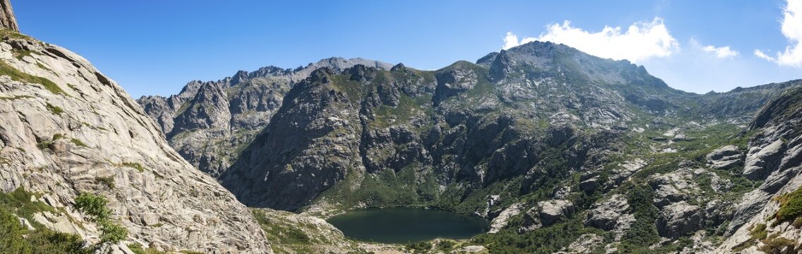 Mountain lake Lac de Melo, view from the Lac de Capitello, mountains in background, Restonica high valley, source of the Restonica River, Corte, Haute-Corse, Corsica, France