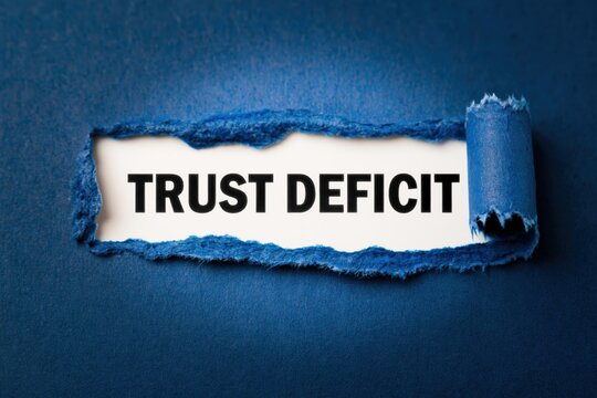 Trust Deficit social issue revealed under a torn paper background