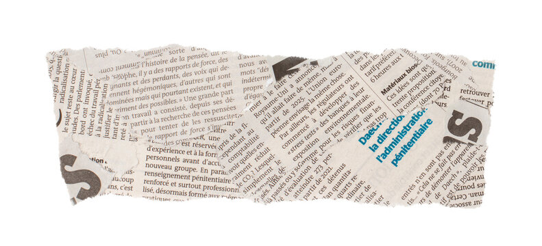 Torn newspaper clipping with French text