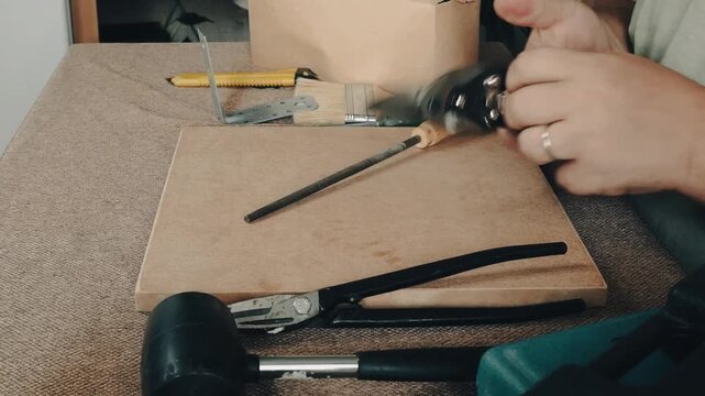 a man collects tools