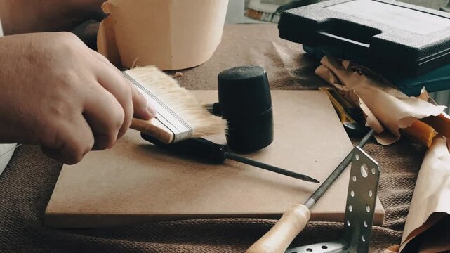 a man collects tools