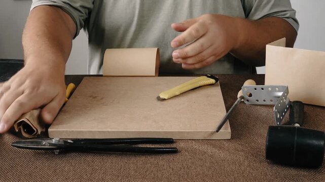 A man is doing repairs.