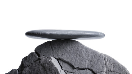 Isolated tranquil smooth oval rock perfectly balanced on rough grey stone structure © Niamh