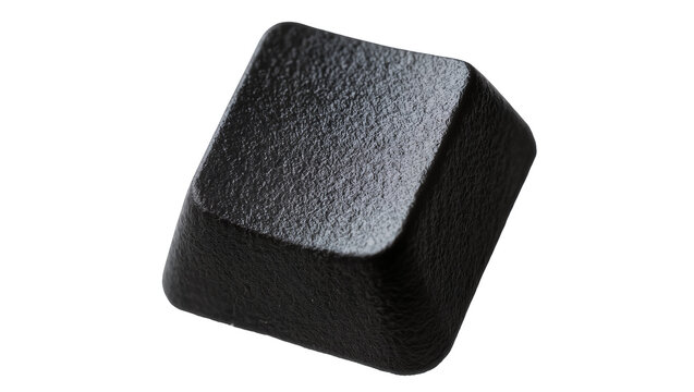 Isolated dark textured square button or keycap, minimalist design element against a neutral backdrop.