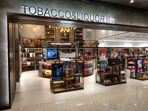 Taipei, Taiwan - March 26, 2025: Interior of a retail store  selling a variety of alcohol, liquor, and tobacco products in the duty free shop at Taoyuan International Airport in Taiwan.