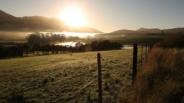 sunrise and fog over lake and farm land, Stanford, South
Africa